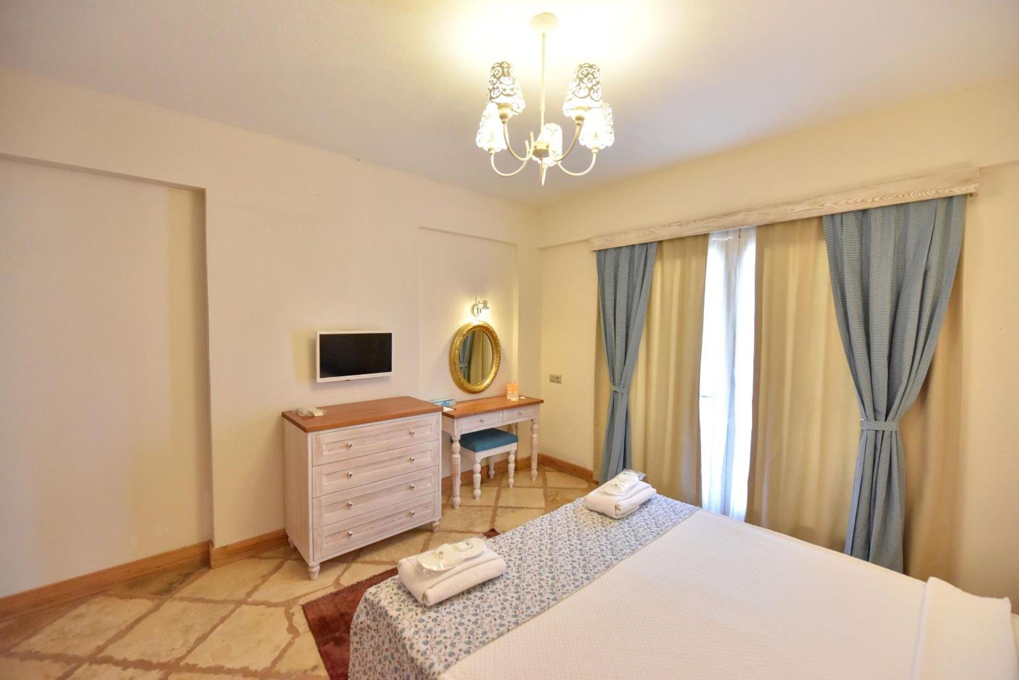 Orino Suites Cedit Quarto foto